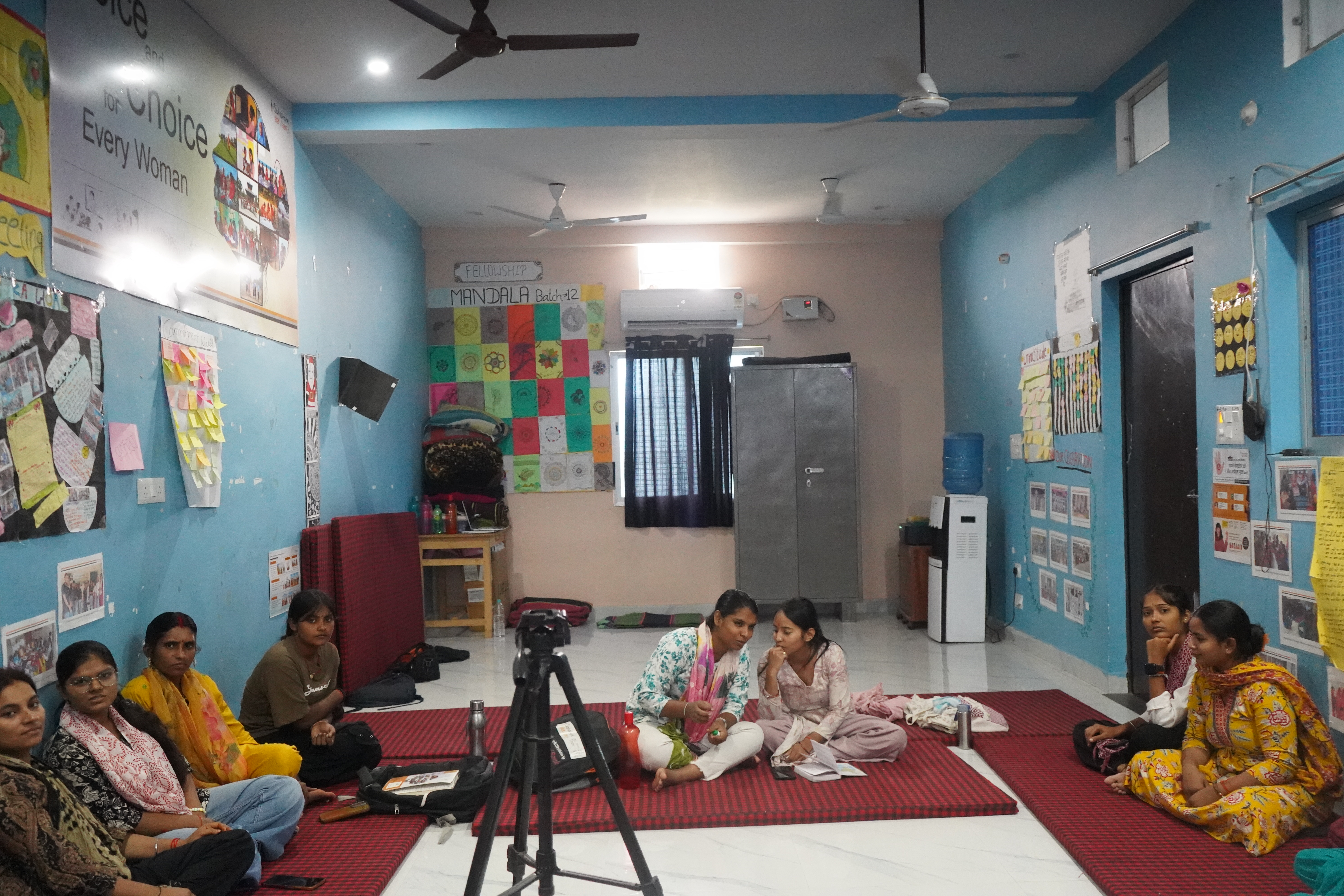 Participants seated in a workshop space